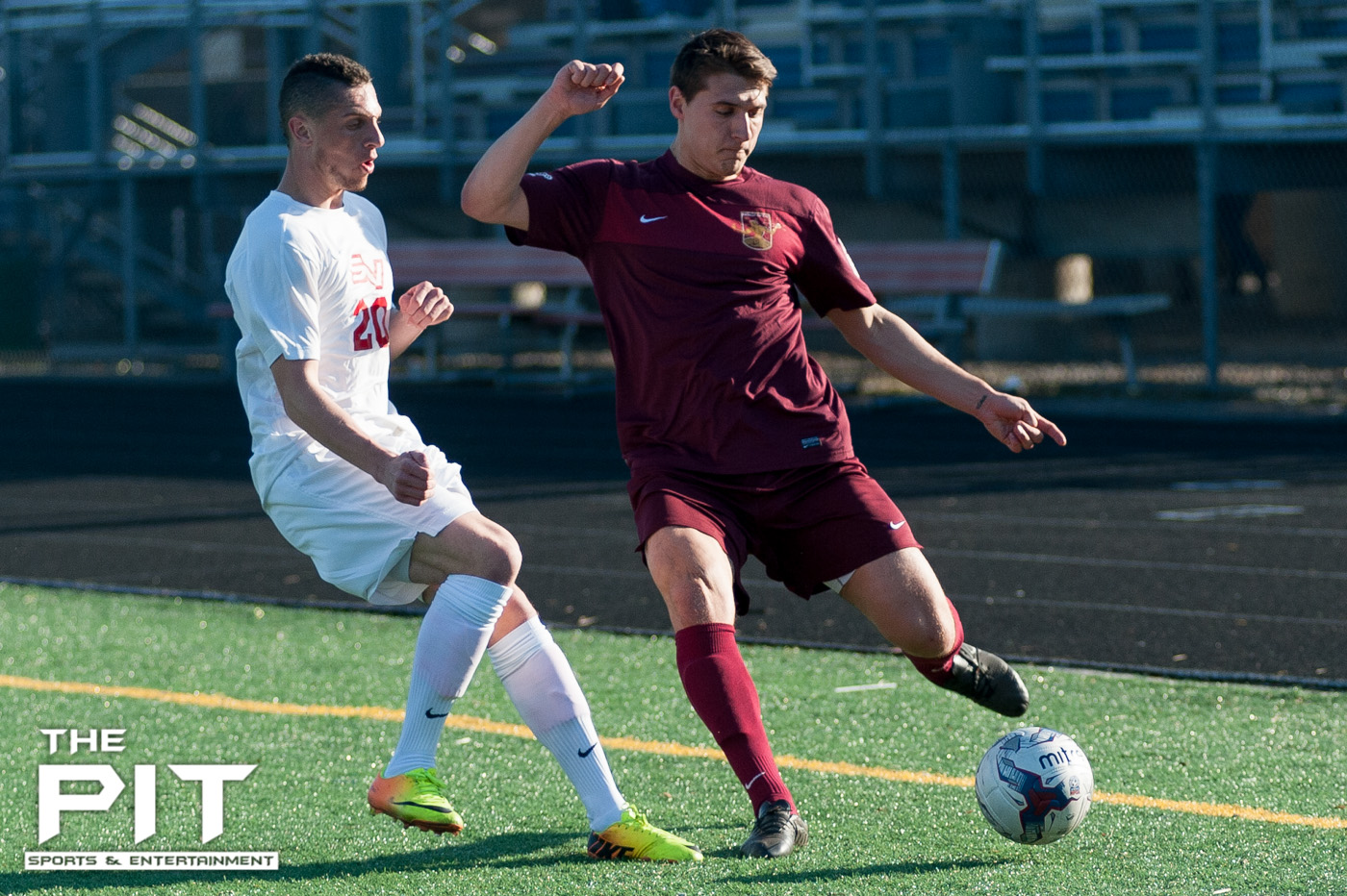 Detroit City FC Forward Wade Allan (16) fights for ball control against an opposing Saginaw Valley Forward at a scrimmage match on April 19, 2014 at Hurley Field. Brian Quintos / The Pit: SE