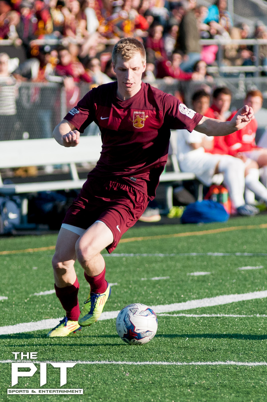 Detroit City FC Forward Zach Meyers (15) pushes the ball up the field for a shot attempt at a scrimmage match against Saginaw Valley on April 19, 2014 at Hurley Field. Brian Quintos / The Pit: SE