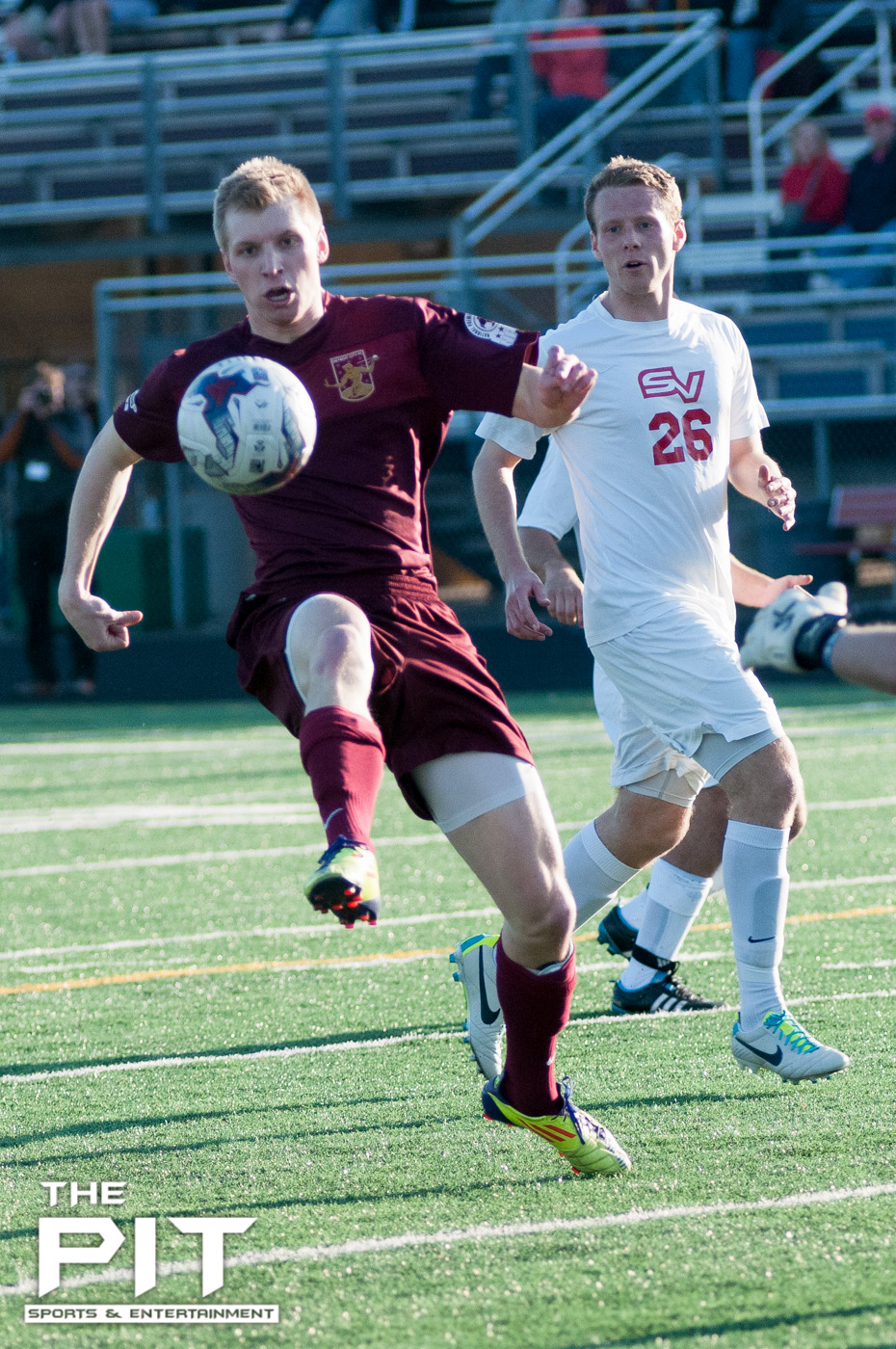 Detroit City FC Zach Meyers (15) fights for ball control against an opposing Saginaw Valley Forward at a scrimmage match on April 19, 2014 at Hurley Field. Brian Quintos / The Pit: SE