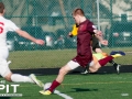Detroit City FC Forward Zach Meyers (15) makes a shot attempt and scores in the first half of a scrimmage match against Saginaw Valley on April 19, 2014 at Hurley Field. Brian Quintos / The Pit: SE