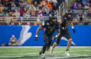 Northwestern defensive back Braden Turner played a part in half of the Wildcats' forced turnovers, picking of Central Michigan QB Angel Flores and then returning a fumble 47 yards to score. Northwestern won the GameAbove Sports Bowl, 34-7, on Friday at Ford Field in Detroit. (Tony Patroske/TPM)
