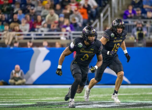 Northwestern defensive back Braden Turner played a part in half of the Wildcats' forced turnovers, picking of Central Michigan QB Angel Flores and then returning a fumble 47 yards to score. Northwestern won the GameAbove Sports Bowl, 34-7, on Friday at Ford Field in Detroit. (Tony Patroske/TPM)