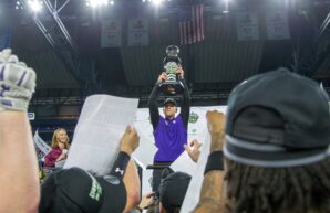 Northwestern coach David Braun holds up the GameAbove Sports Bowl trophy following the Wildcats' 34-7 win over Central Michigan at Ford Field in Detroit on Friday, Dec. 26, 2025. (Tony Patroske/TPM)