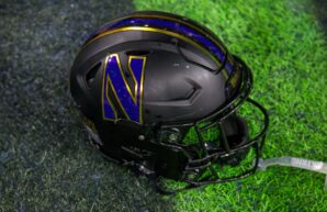 Northwestern helmet on the turf at Ford Field in Detroit following the GameAbove Sports Bowl on Dec. 26, 2025. (Tony Patroske/TPM)