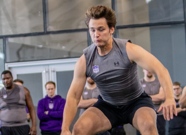 Northwestern quarterback Preston Stone performs a standing broad jump for NFL scouts during the Wildcats' 2026 Pro Day event at Ryan Fieldhouse in Evanston, Ill., on Tuesday, March 17, 2026. (Stephanie Sokol/TPM)