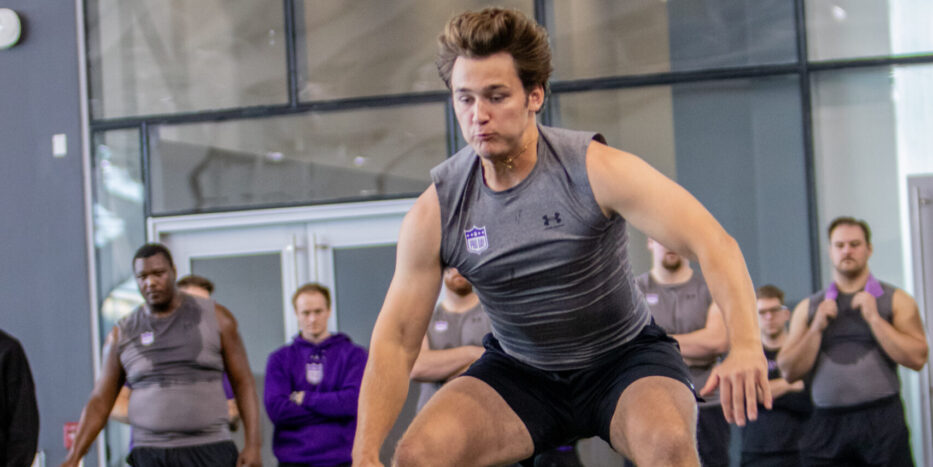 Northwestern quarterback Preston Stone performs a standing broad jump for NFL scouts during the Wildcats' 2026 Pro Day event at Ryan Fieldhouse in Evanston, Ill., on Tuesday, March 17, 2026. (Stephanie Sokol/TPM)
