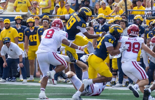 The Michigan offense runs through quarterback Bryce Underwood (19), as he led the Wolverines through the air with 111 yards and on the ground with 18 carries for 87 yards and a touchdown. (Tony Patroske/TPM)