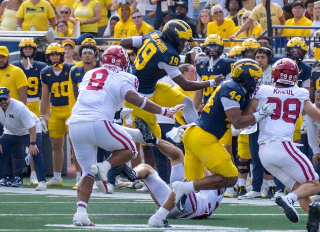 The Michigan offense runs through quarterback Bryce Underwood (19), as he led the Wolverines through the air with 111 yards and on the ground with 18 carries for 87 yards and a touchdown. (Tony Patroske/TPM)