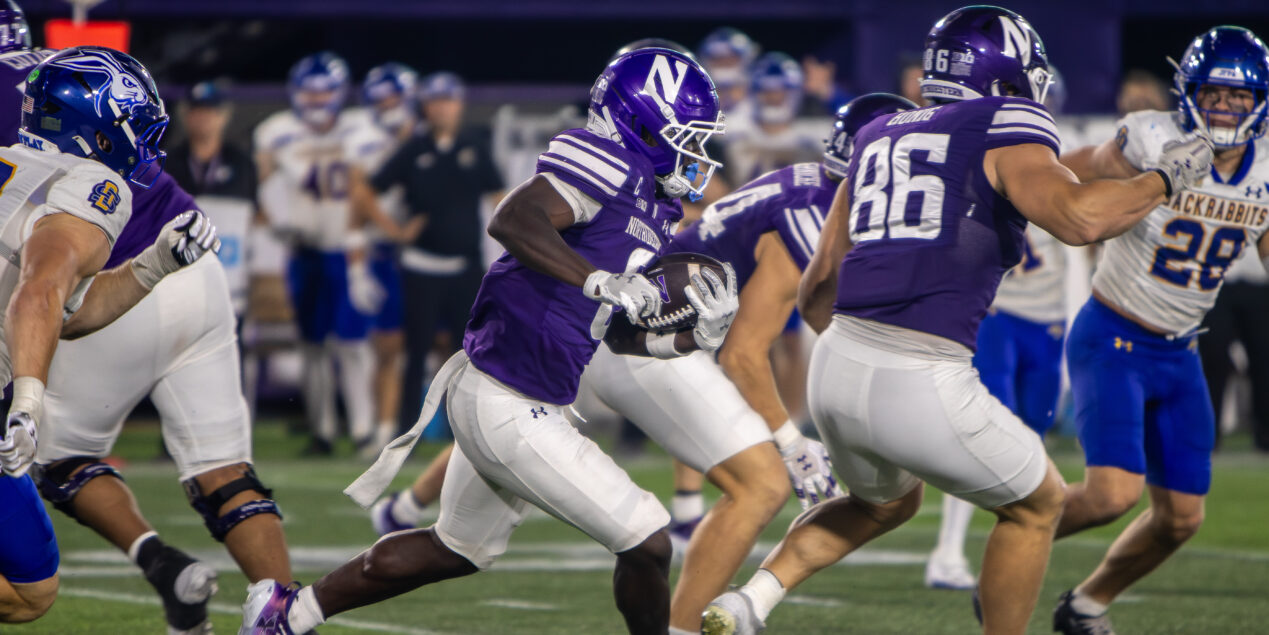 Northwestern running back Joseph Himon III sprints 80-yards to score in the closing minutes of Saturday's 34-18 win over South Dakota State. (Damien Dennis/TPM)