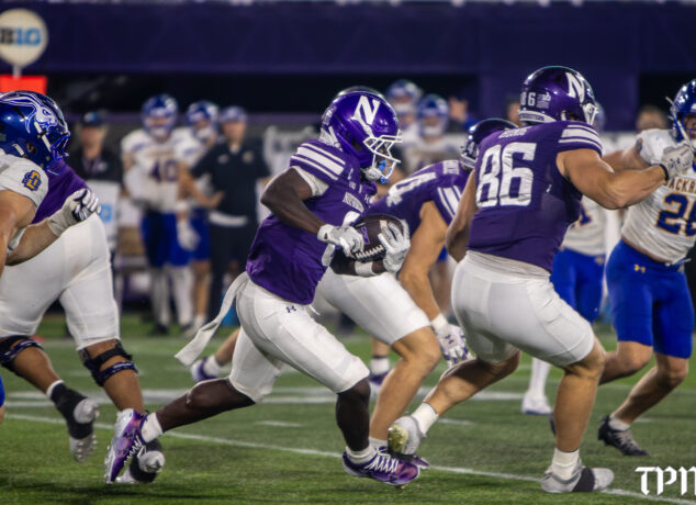 Northwestern running back Joseph Himon III sprints 80-yards to score in the closing minutes of Saturday's 34-18 win over South Dakota State. (Damien Dennis/TPM)