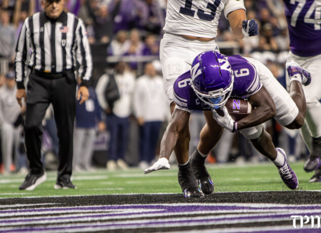 Northwestern running back Joesph Himon II (6) dives into the endzone Friday, Oct. 2, 2026 in Evanston against Penn State. The Wildcats won, 34-13. (Damien Dennis/TPM)